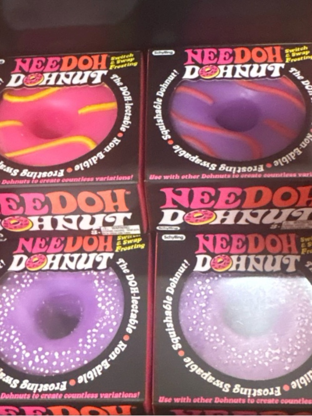 Needoh Donut Squishy Stress Toy - Purple. Ships fast & in safe packaging